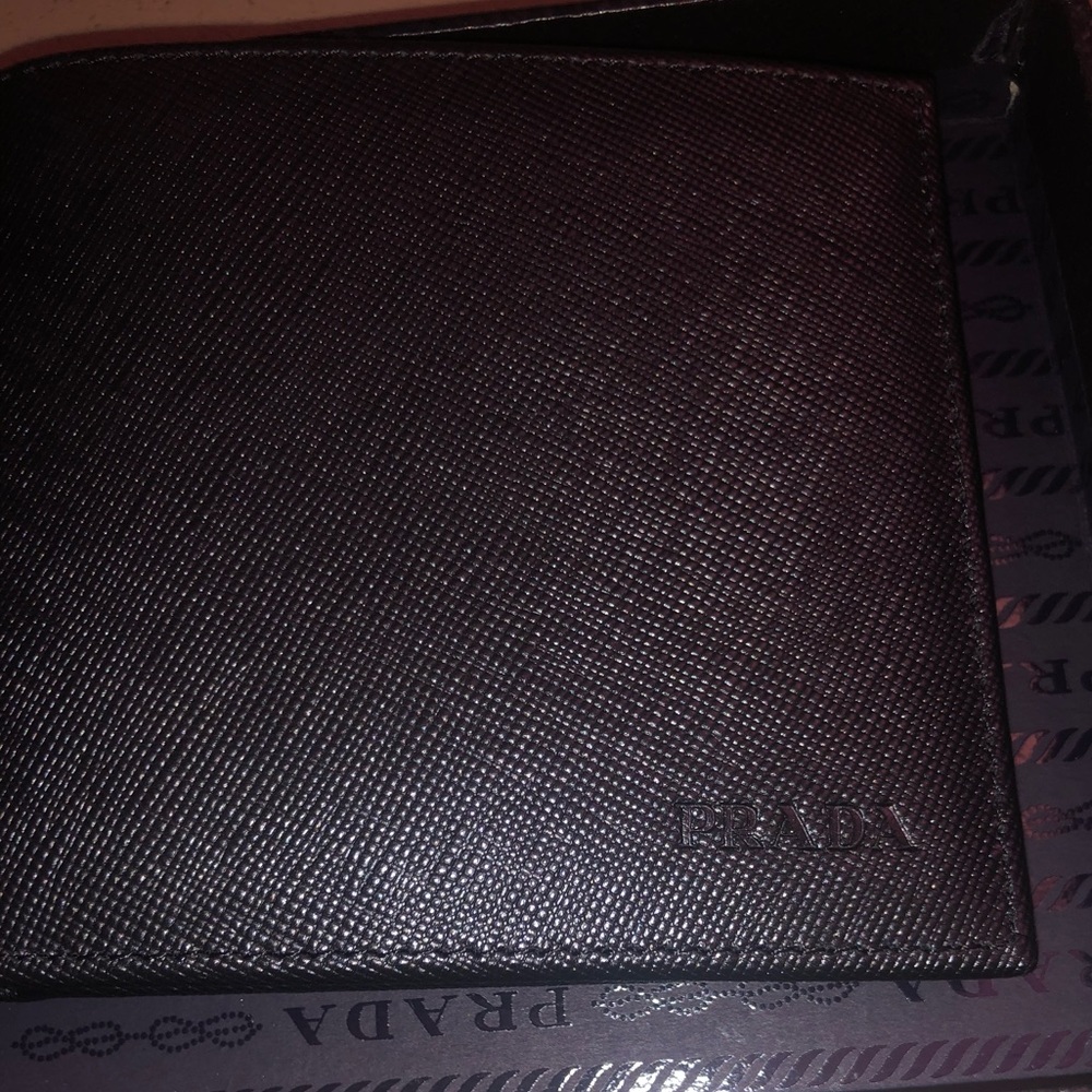 Never been used Men’s Prada Wallet. Flawless.